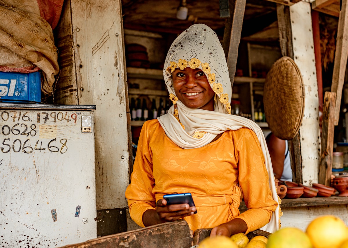 Small business owner serving a customer